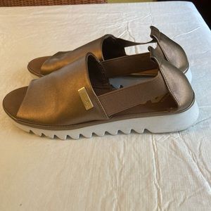AK Sport bronze colored sandals, size 7